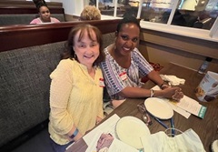 moms enjoying dinner together 